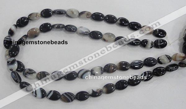 CAA210 15.5 inches 10*14mm oval madagascar agate beads