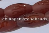 CAA3692 15.5 inches 8*16mm rice matte & carved red agate beads