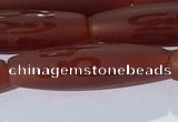 CAA3694 15.5 inches 8*30mm rice matte & carved red agate beads