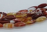 CAB480 15.5 inches 5*12mm faceted rice red agate beads wholesale