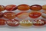 CAB481 15.5 inches 8*15mm faceted rice red agate beads wholesale