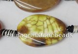 CAG1578 15.5 inches 20*30mm twisted oval fire crackle agate beads