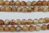 CAG1885 15.5 inches 6mm faceted round lemon crazy lace agate beads