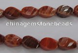 CAG581 15.5 inches 8*12mm faceted & twisted rice natural fire agate beads