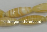 CCA209 15.5 inches 10*30mm rice yellow lace calcite beads