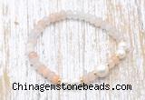 CFB711 faceted rondelle pink aventurine & potato white freshwater pearl stretchy bracelet