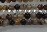 CAA1035 15.5 inches 4mm round dragon veins agate beads wholesale