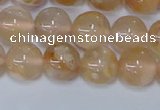 CAA1073 15.5 inches 10mm round sakura agate gemstone beads