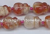 CAA1183 15.5 inches 15*20mm carved calabash sakura agate beads