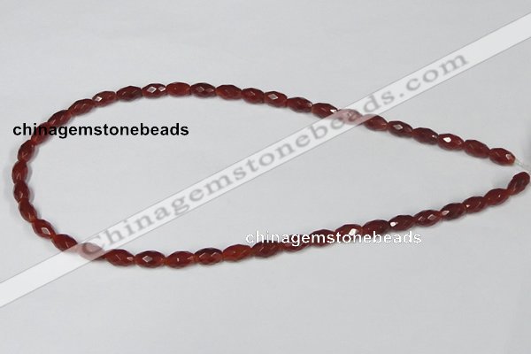 CAA124 15.5 inches 6*10mm faceted rice red agate gemstone beads