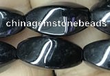 CAA2483 15.5 inches 8*16mm twisted rice black agate beads