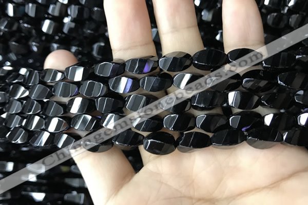 CAA2490 15.5 inches 6*12mm faceted & twisted rice black agate beads