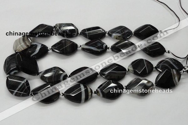 CAA286 22*30mm twisted & faceted oval black line agate beads