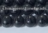 CAA3660 15.5 inches 6mm round matte & carved black agate beads