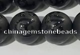 CAA3678 15.5 inches 12mm round matte & carved black agate beads