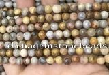 CAA4934 15.5 inches 6mm round yellow crazy lace agate beads wholesale