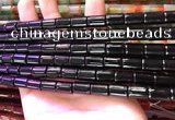 CAA4999 15.5 inches 8*12mm tube black agate beads wholesale