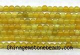 CAA6276 15 inches 4mm round yellow fire agate beads