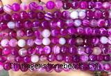CAA6325 15 inches 6mm faceted round fuchsia banded agate beads