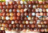 CAA6330 15 inches 6mm faceted round red banded agate beads