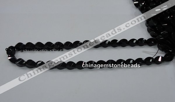 CAB335 15.5 inches 8*12mm faceted & twisted rice black agate beads