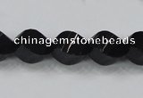 CAB336 15.5 inches 10*14mm faceted & twisted rice black agate beads