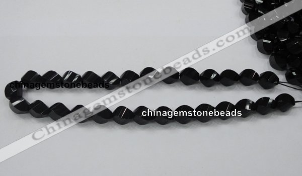 CAB336 15.5 inches 10*14mm faceted & twisted rice black agate beads