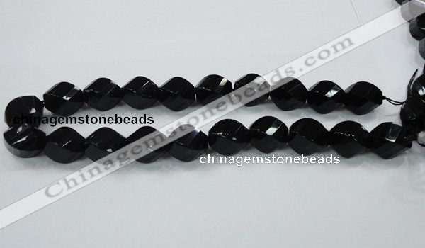 CAB338 15.5 inches 18*24mm faceted & twisted rice black agate beads