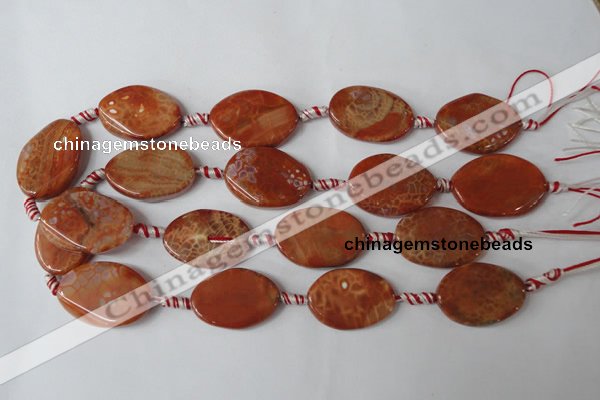 CAG1590 15.5 inches 20*30mm twisted oval fire crackle agate beads