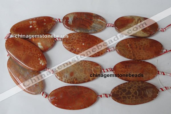 CAG1592 15.5 inches 25*50mm twisted oval fire crackle agate beads