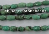 CAG1605 15.5 inches 6*9mm faceted rice green grass agate beads