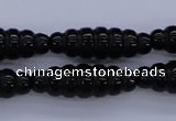 CAG1695 15.5 inches 10*30mm carved rice black agate beads