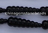 CAG1697 15.5 inches 10*35mm carved teardrop black agate beads