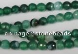 CAG2112 15.5 inches 6mm faceted round green line agate beads