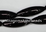 CAG2969 15.5 inches 10*30mm rice black line agate beads