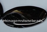 CAG3015 15.5 inches 25*50mm twisted oval black line agate beads