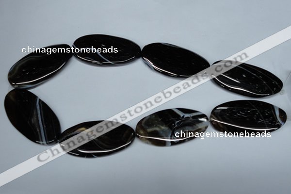 CAG3015 15.5 inches 25*50mm twisted oval black line agate beads