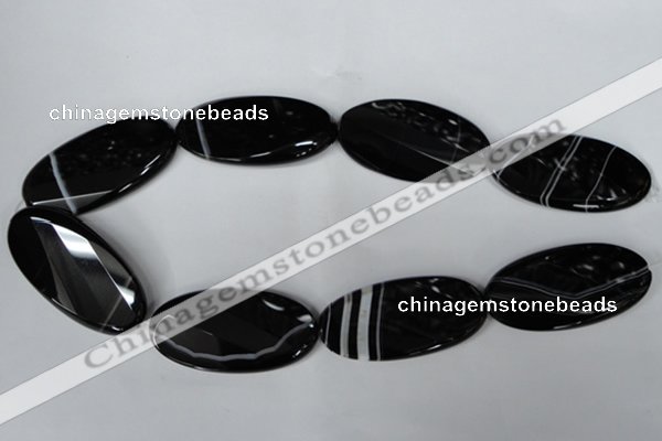 CAG3086 15.5 inches 25*50mm faceted oval black line agate beads