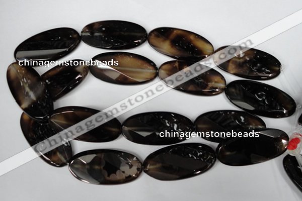 CAG3091 15.5 inches 25*50mm faceted oval black line agate beads