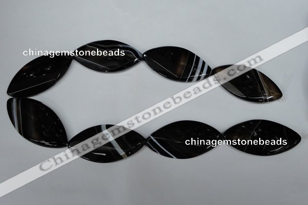 CAG3095 15.5 inches 25*50mm faceted & twisted oval black line agate beads