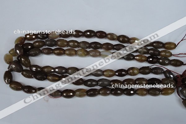 CAG3129 15.5 inches 10*14mm faceted rice brown line agate beads