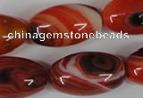 CAG3274 15.5 inches 16*30mm rice red line agate beads