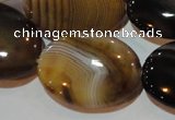 CAG3498 15.5 inches 22*30mm oval brown line agate beads