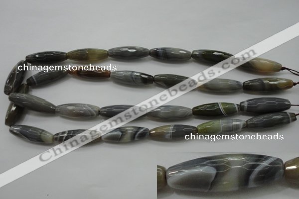 CAG3958 15.5 inches 10*30mm faceted rice grey botswana agate beads