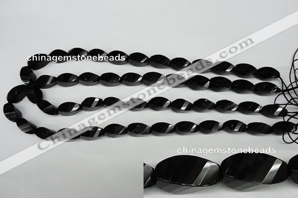 CAG4009 15.5 inches 8*16mm faceted & twisted rice black agate beads