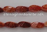 CAG4181 15.5 inches 7*14mm faceted & twisted rice natural fire agate beads