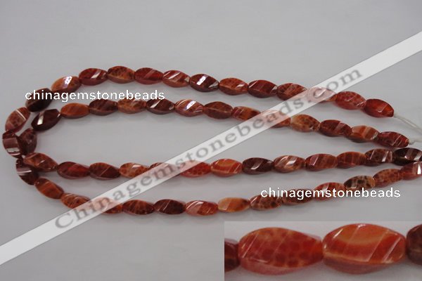 CAG4181 15.5 inches 7*14mm faceted & twisted rice natural fire agate beads