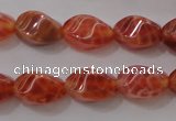 CAG4184 15.5 inches 6*10mm twisted rice natural fire agate beads