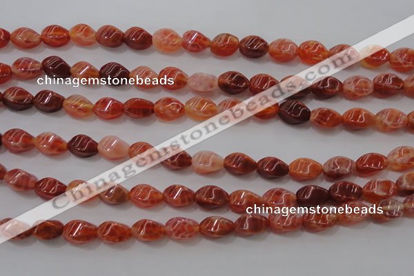 CAG4184 15.5 inches 6*10mm twisted rice natural fire agate beads