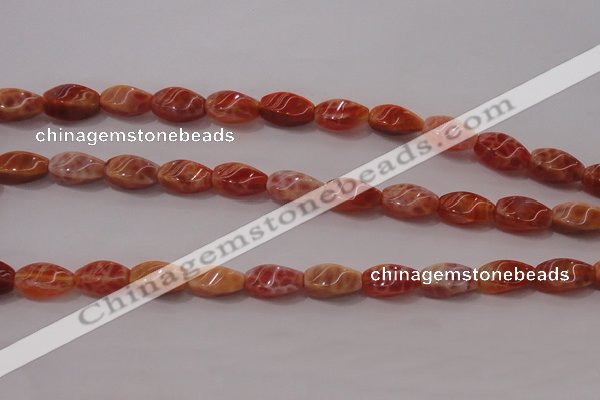 CAG4185 15.5 inches 6*12mm twisted rice natural fire agate beads